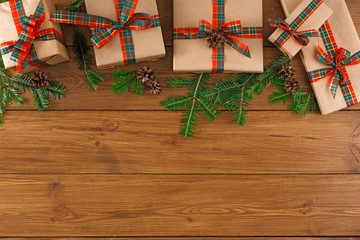 Colorful present boxes for any holiday on wooden background