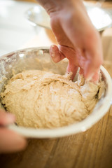 Kneading Dough in Aluminum Bowl