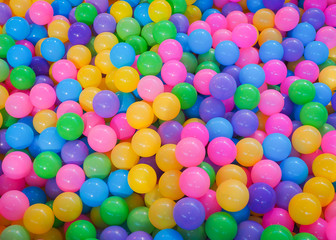 Many color plastic balls in kid playground