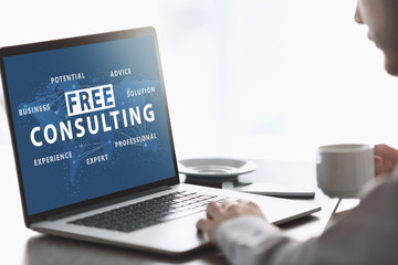 Businessman using laptop, closeup