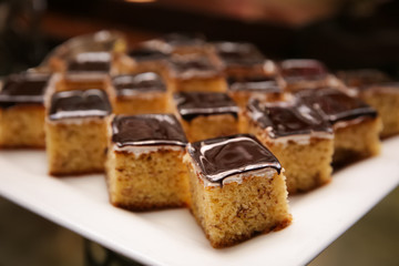 Closeup of delicious cakes on plate