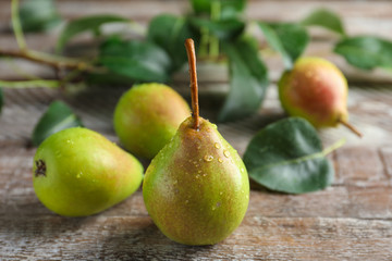 Delicious ripe pears on table