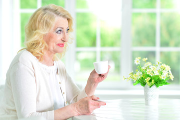 senior woman with cup of tea