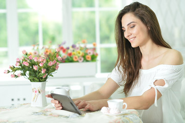 young woman with tablet