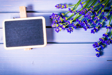 lavender with sale chalkboard on wooden background