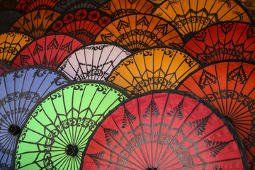 Traditional umbrellas of different colors on the market, Bagan, Myanmar (Burma)