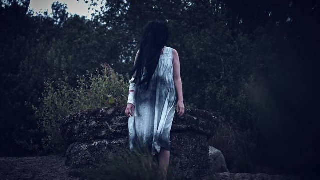 4k Horror Woman in Dirty Dress Standing in Wind