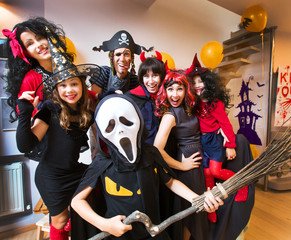Fototapeta na wymiar Big family in halloween costumes