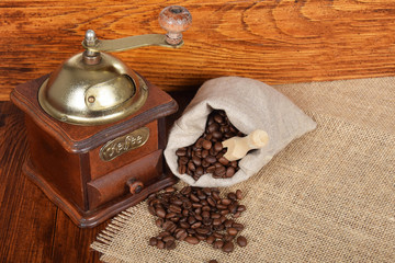 Old retro, manual grinder for grinding coffee beans with empty space for text