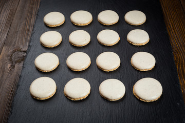 Biscuit sweet cookie background. Domestic stacked butter biscuit pattern concept,close up macro.Homemade cookies on wooden table.Cereal biscuits with the sesame,peanuts,sunflower and amaranth.
