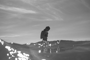 Young woman in the sea