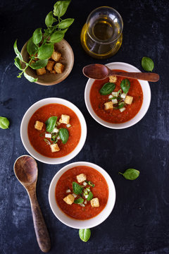 Gazpacho: Bowls of Gazpacho on a dark background.