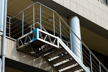 metal chrome ladder on the building