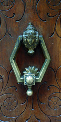 vintage wood door with brass knocker