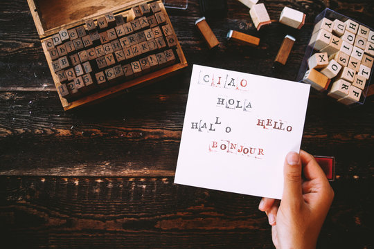 Woman write with stamps