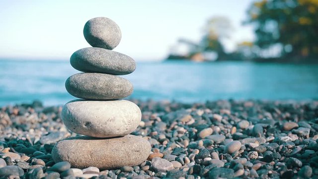 Stack Of Balanced Stones On The Beach