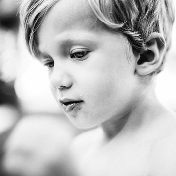 Monochrome portrait of a thoughtful little boy