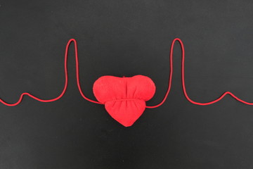  plush heart was clamped with a red thread