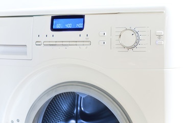 The washing machine - a close up of the display and a choice of programs..