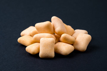 Close up chewing gum on black