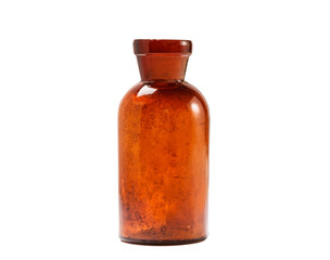 Vintage small glass bottle made of brown glass isolated on white