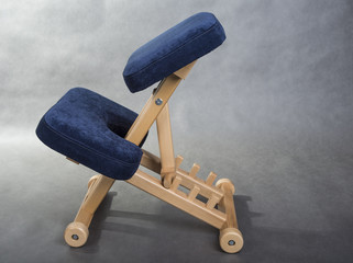 Kneeling chair for healthy sitting. Knee chair support your back.