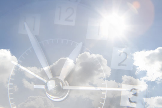 Clock in sky daylight saving