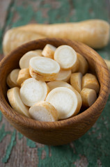 parsnip on wooden surface