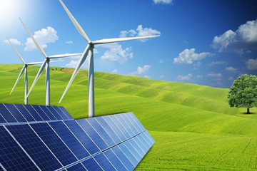 Obraz premium Eco power, ecological green energy with photovoltaic panels and windmill in field