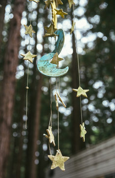 Star and moon mobile wind chime outside