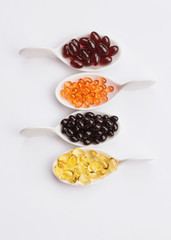 Healthy Supplements on spoons 
