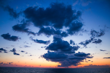 Sunset seascape with dramatic sky and colorful clouds