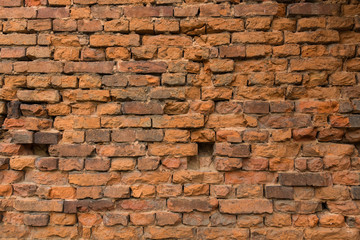 Red old brick wall, destroyed