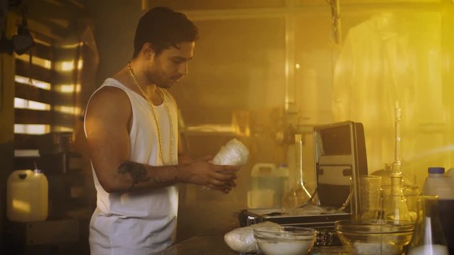 Drug Dealer Placing Drug Bricks into Suitcase is Arrested by a Fully Armed Special Anti-Narcotics Task Forces Soldier. Dealer Raises Hands and Surrenders. 