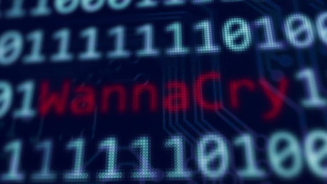 WannaCry red text between binary data background blue screen with depth of field in 4k