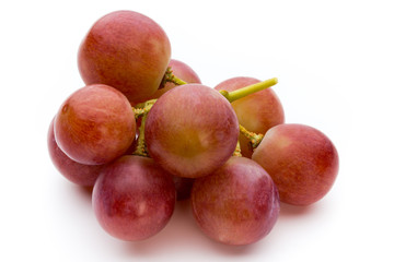 Ripe red grape isolated on white.