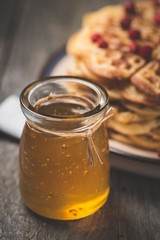 Dessert. Homemade sweet and hot pancakes on a rustic table
