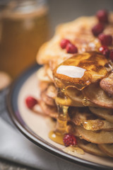 Dessert. Homemade sweet and hot pancakes on a rustic table