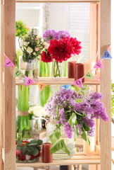 Shelf unit decorated for lesbian wedding, indoors