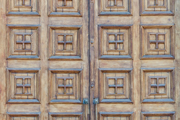Old wooden door wide, the squares