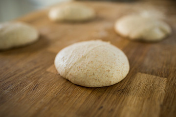 Fototapeta na wymiar Bread Dough on Wooden Counter