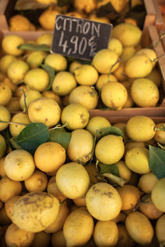 Fresh organic lemons in street market