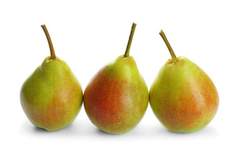 Delicious ripe pears on white background