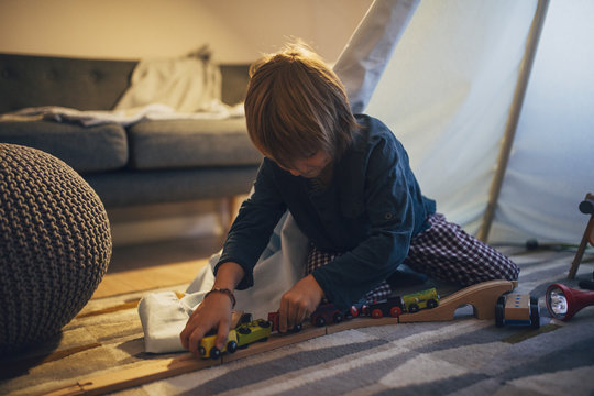 Boy Playing in Tent