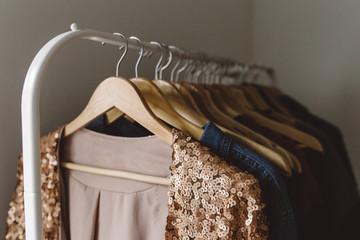 Sequin pink jacket hanging on clothing rack