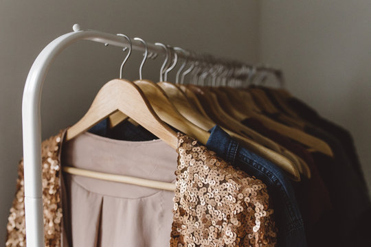 Sequin pink jacket hanging on clothing rack