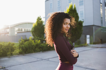 Portrait of attractive young businesswoman smiling at the camera