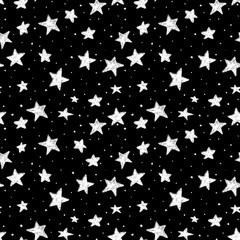 Obraz na płótnie Canvas beautiful seamless pattern hand drawn doodle stars black and white isolated on background. night sky
