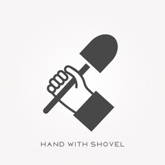 Silhouette icon hand with shovel
