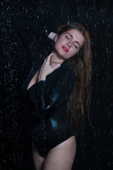 Sexy beautiful woman under rain